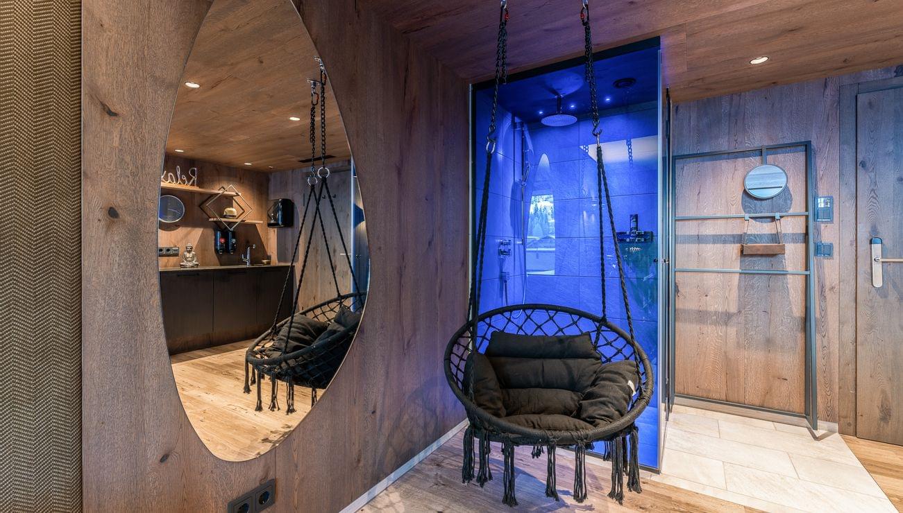 Massage room with hanging chair